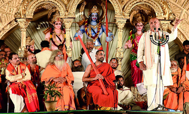 Praveen Togadia speaks while Chinna Jeeyar Swamy, right, Kamalananda Bharathi, centre, and scholar Nagaphani Sharma look on at the VHP public meeting at NTR stadium. (Photo: DC) Praveen Togadia speaks while Chinna Jeeyar Swamy, right, Kamalananda Bharathi, centre, and scholar Nagaphani Sharma look on at the VHP public meeting at NTR stadium. (Photo: DC)
